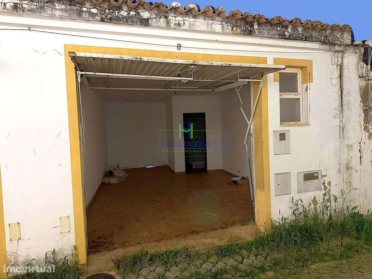 Prédio Urbano destinado a Estacionamento Coberto passível de Conversão-3