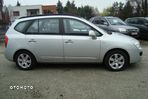 Kia Carens - 4