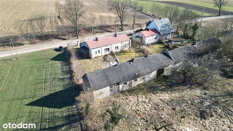 Połowa domu do remontu, duży potencjał.-6