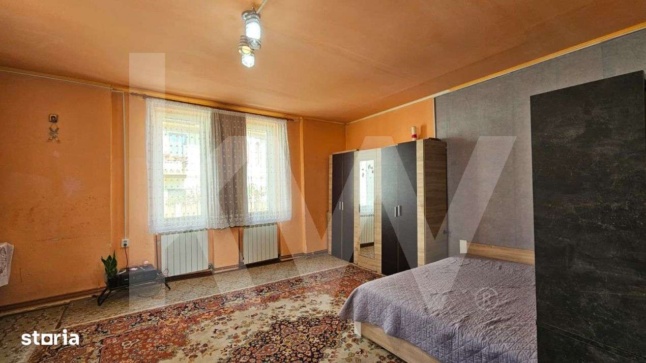 Casa individuala compusa din doua apartamente, cu teren liber de 540 m - Imagine principală: 4/19