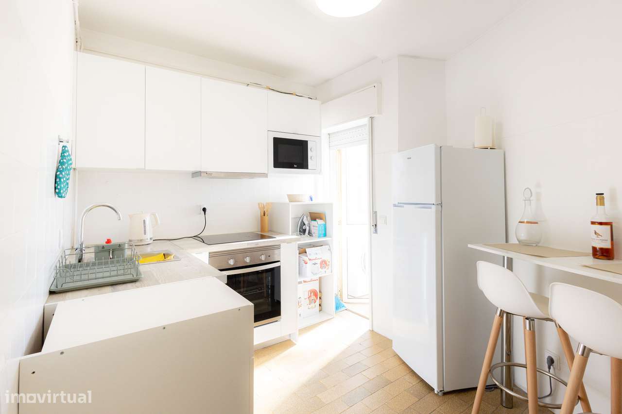 T2 com varanda, garagem e localização central-11