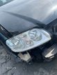 Lampa przód przednia lewa prawa VW Touran / Caddy L041 - 1
