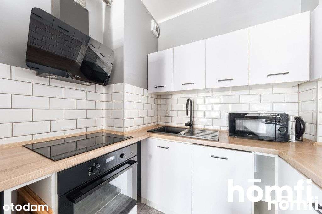 Na Sprzedaż Przestronne 2-Pokojowe Mieszkanie - Pełny obrazek: 5/13