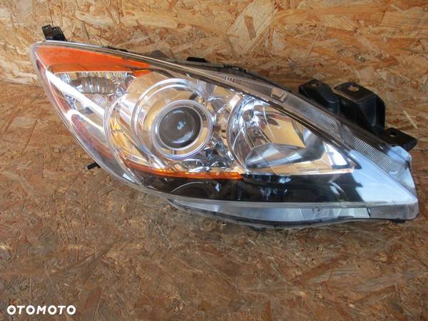 LAMPA PRAWA PRZÓD PRZEDNIA MAZDA 3 BL 08- SOCZEWKA - 1