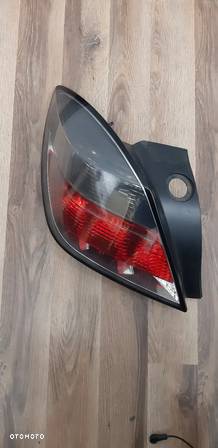 Lampa lewa lewy tył Opel Astra H 3D 2006r. 24451832 - 3