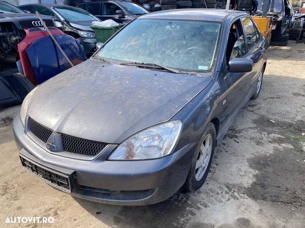 Dezmembrez Mitsubishi Lancer 1.6i 2006 4G18 - 1