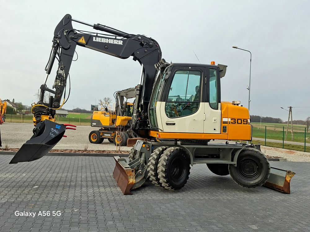 Liebherr A309 rototilt ze szczypcami 2007