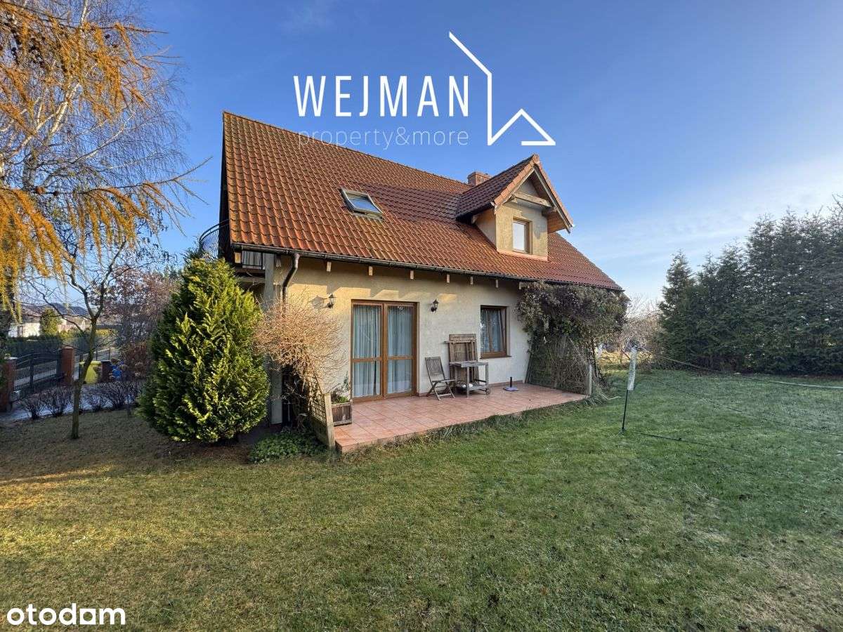 Przytulny i kameralny dom z zadbanym ogrodem-0