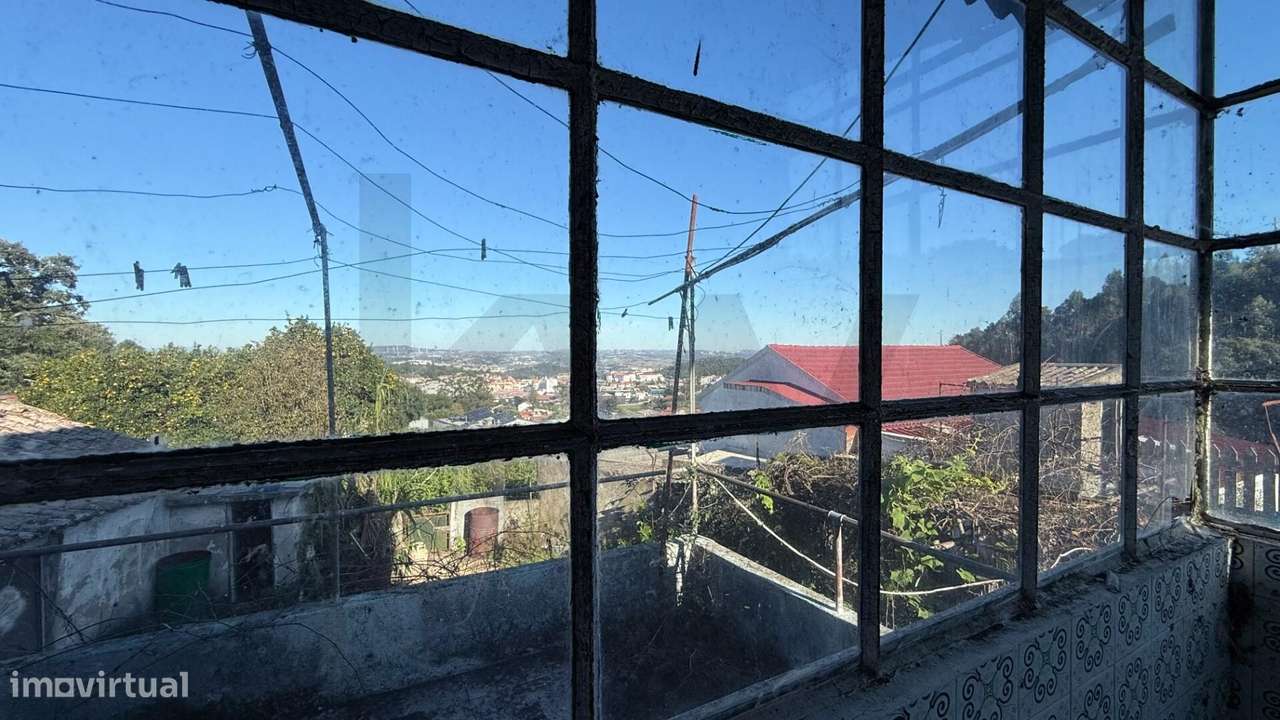 Moradia para reconstrução | Terreno 1.506 m2 | Vista campo | Periferia-34