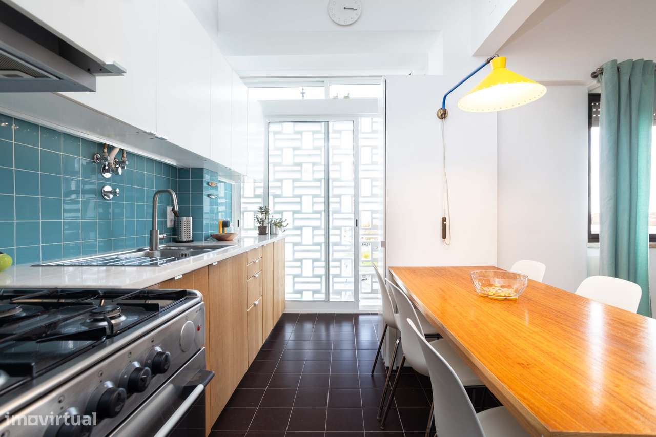 Apartamento T2 Renovado com Vista Rio no Beato: Conforto e Charme Junt - Grande imagem: 4/25