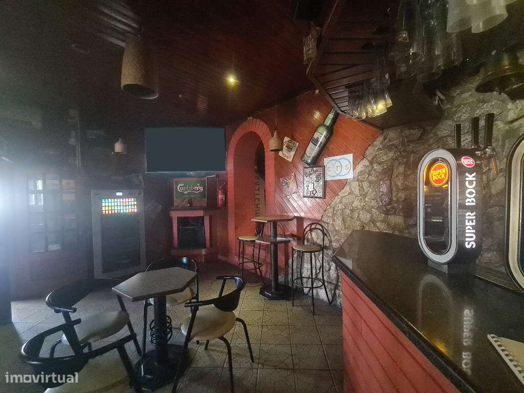 Prédio com T3 com uma loja e garagem em zona de Antanhol - Grande imagem: 5/5