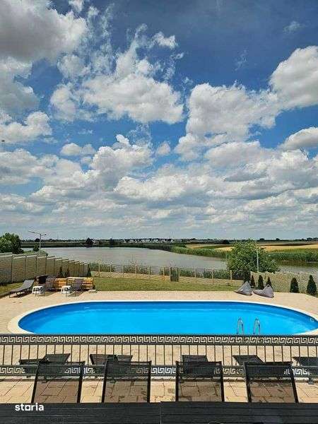 inchiriere vila petreceri/evenimente cu piscina,loc de joaca pe lac - Imagine principală: 2/8