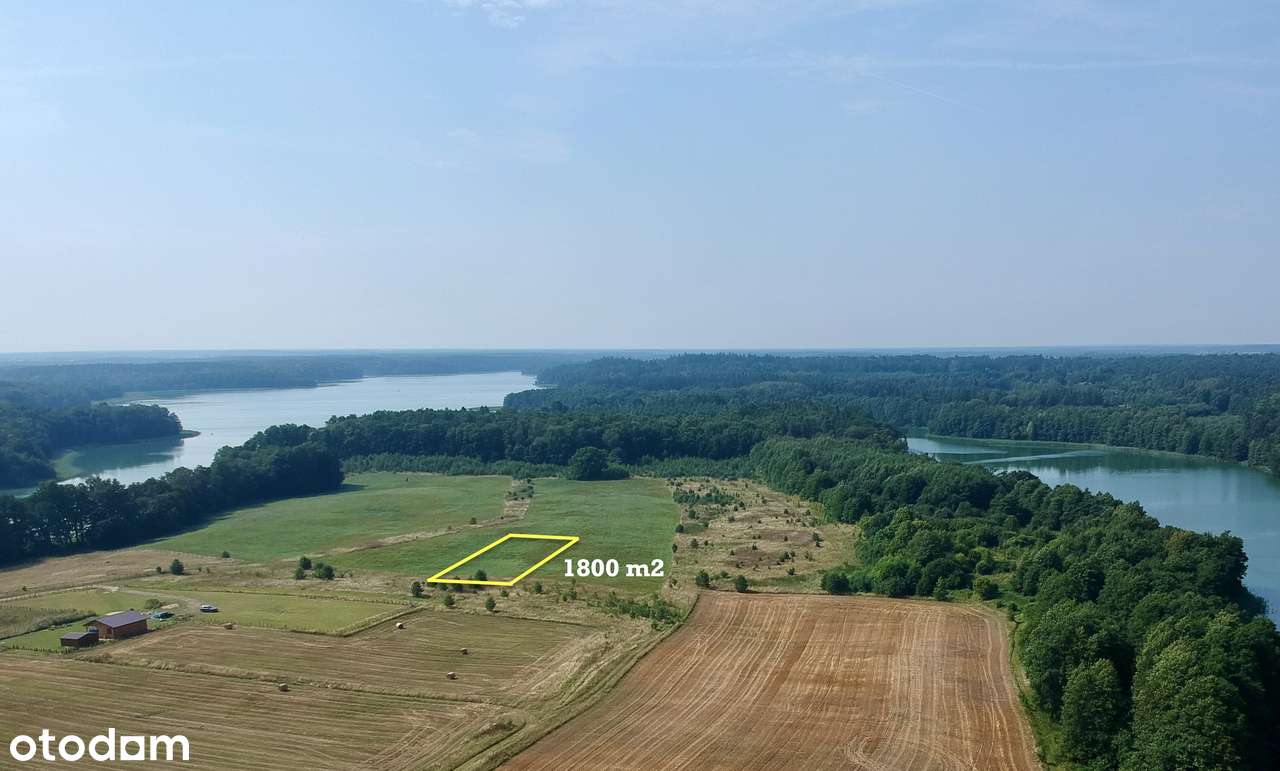 Piękna w pełni uzbrojona działka budowlana nad samym wielkim jeziorem.-3