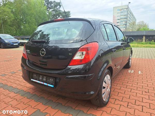 Opel Corsa 1.4 16V Enjoy - 24