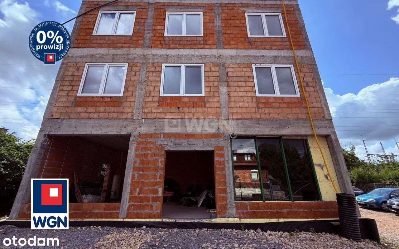 Budynek handlowo-usługowy z częścią mieszkalną sta-6