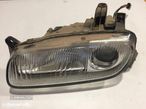 farol optica esquerdo mazda 323 F - 1