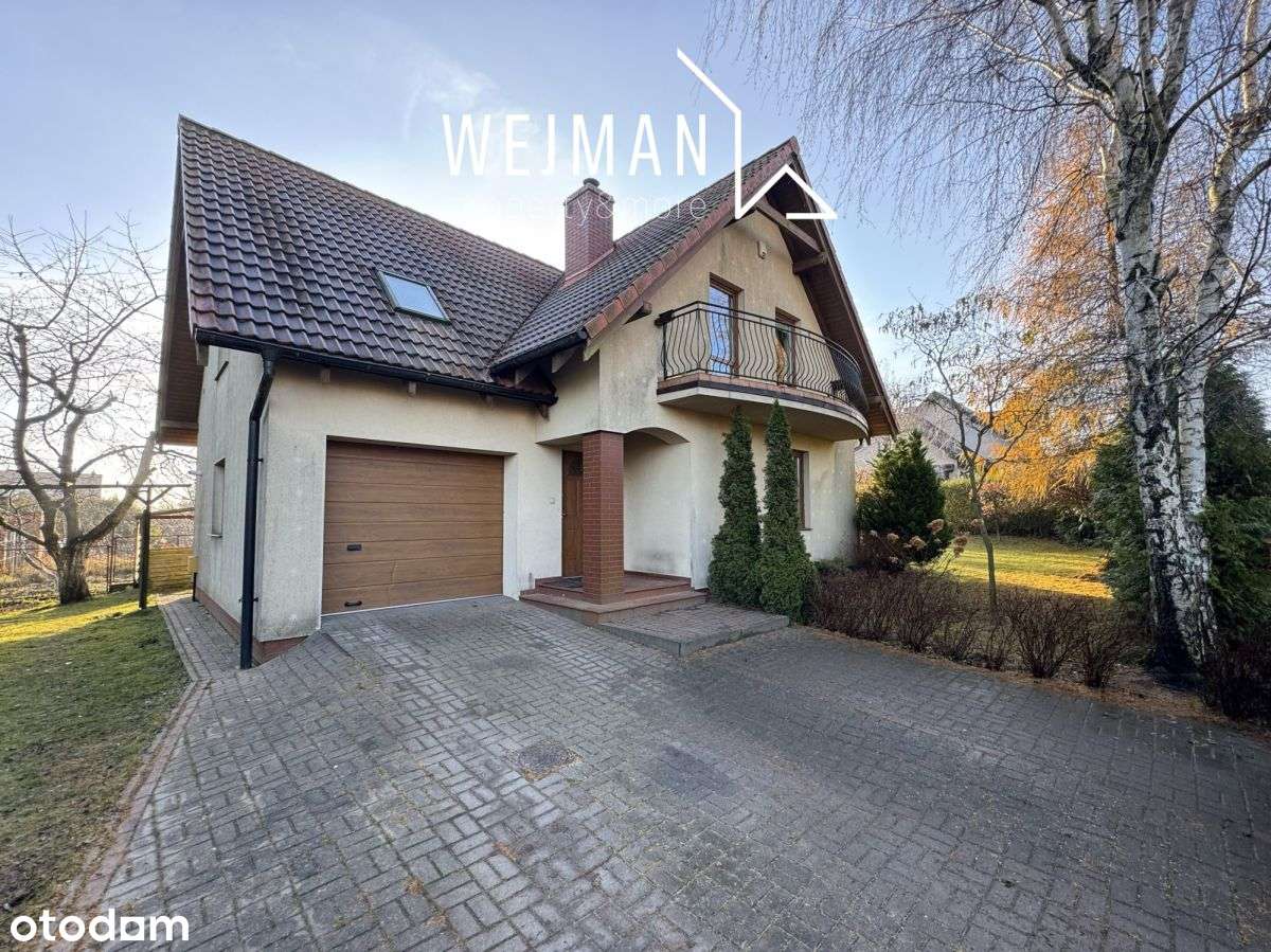 Przytulny i kameralny dom z zadbanym ogrodem-1