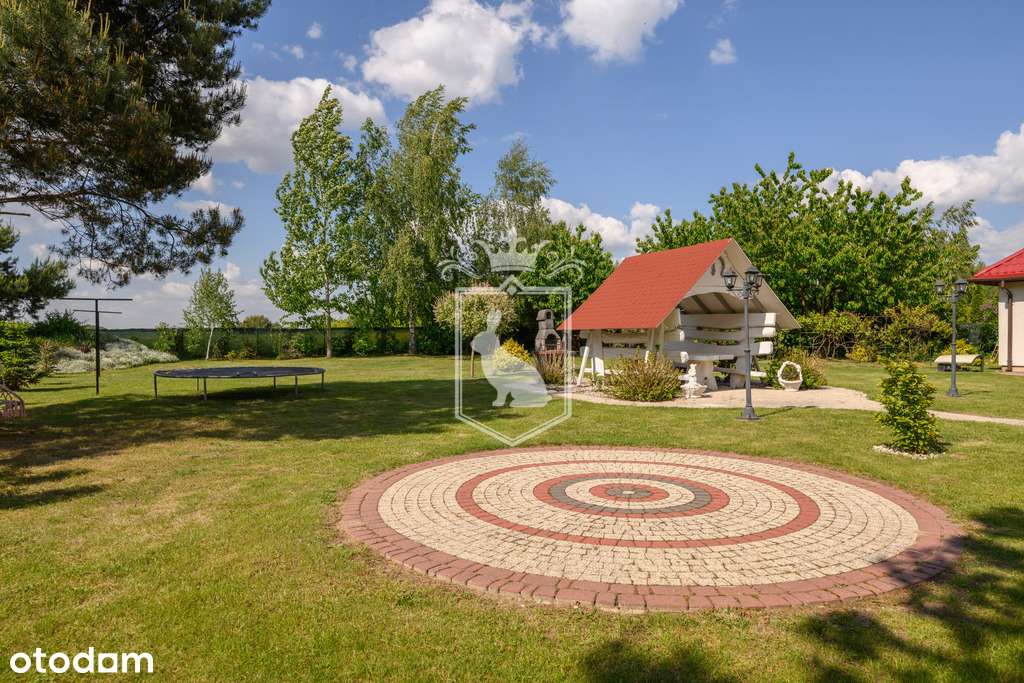 Piękny dom parterowy na imponującej działce 2130m2-14