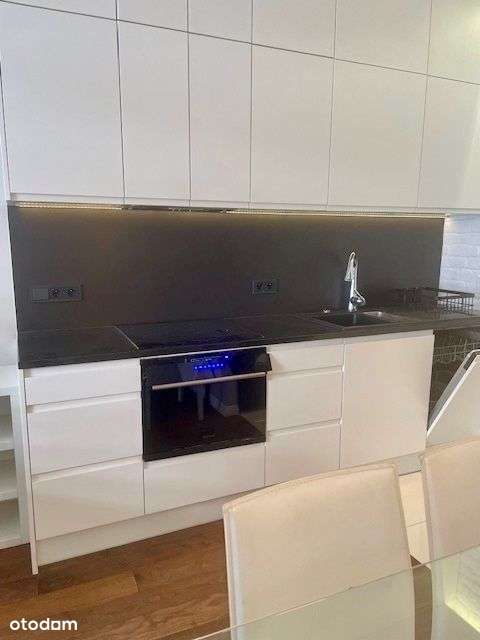 Ciche mieszkanie w budynku Trio-7