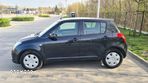 Suzuki Swift 1.3 Club - 4