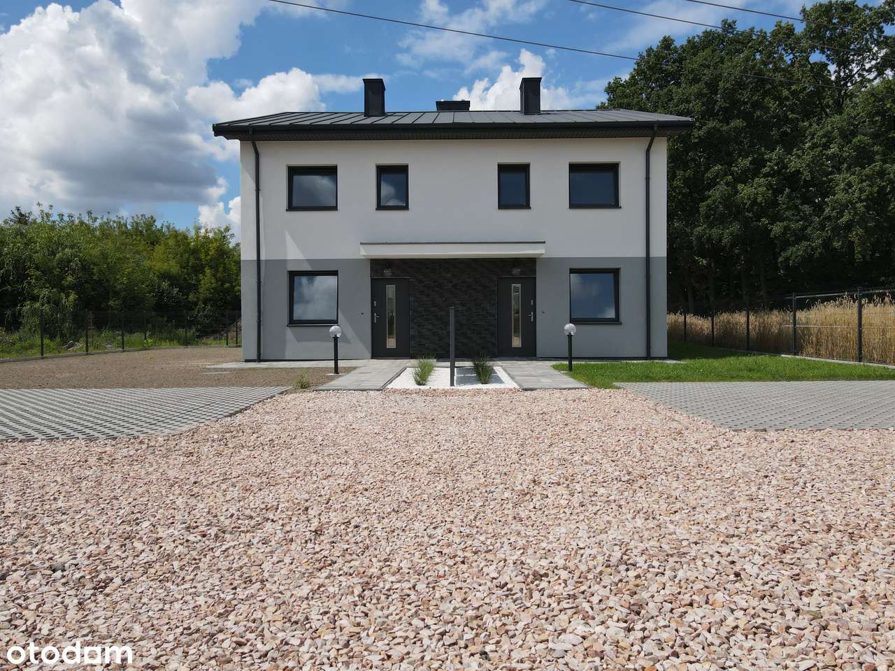 Nowoczesny dom w zabudowie bliźniaczej - Słomin-17