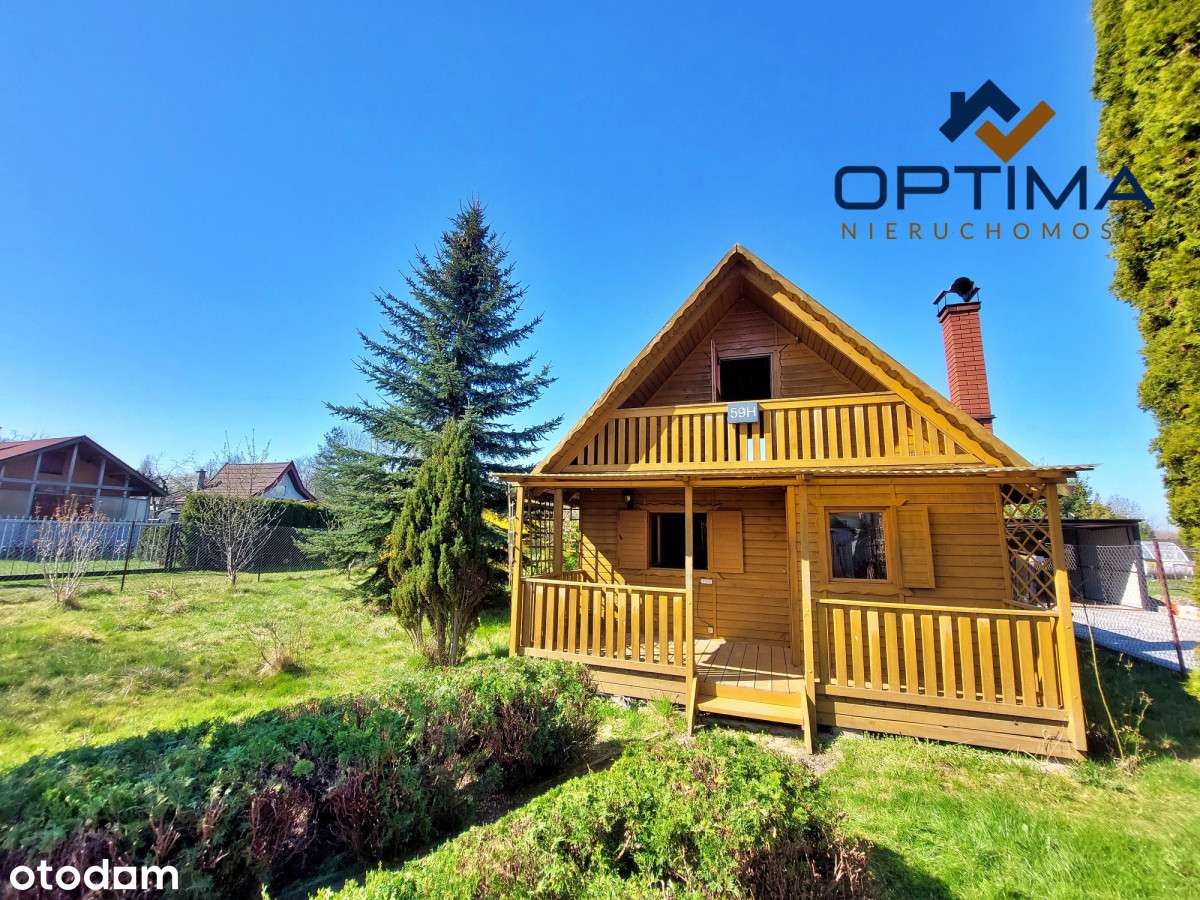 Domek w Olzie nad wodą - duża działka.-0