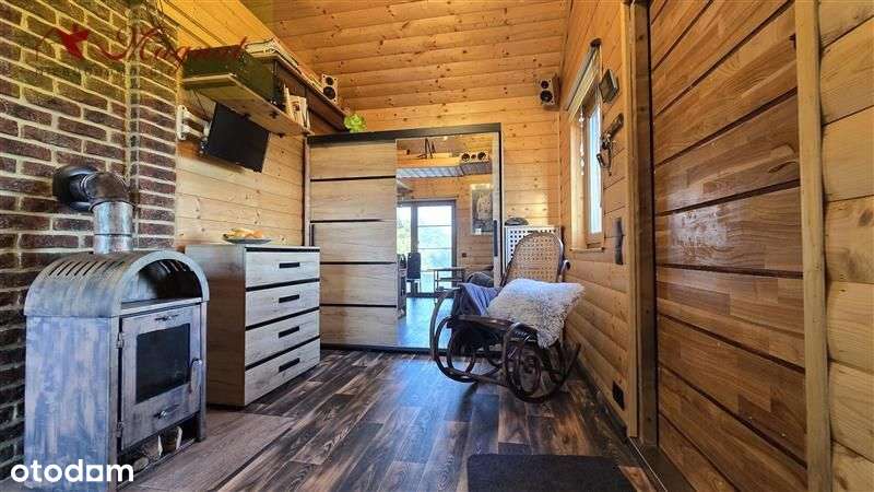 Atrakcyjny dom drewniany całoroczny na dużej dział-8