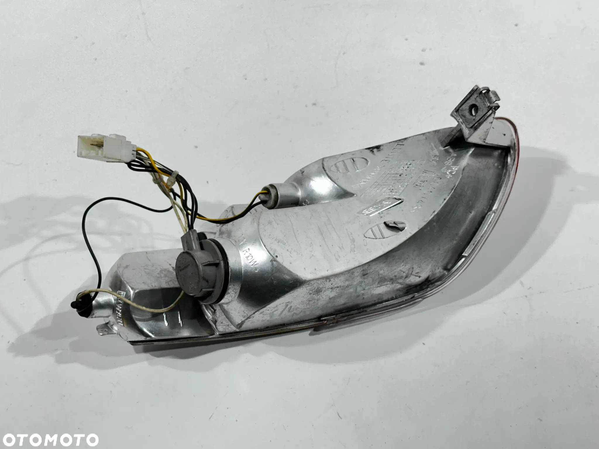 Lampa tył lewa Piaggio MP3 125 300 400 500 06-12r. - 3