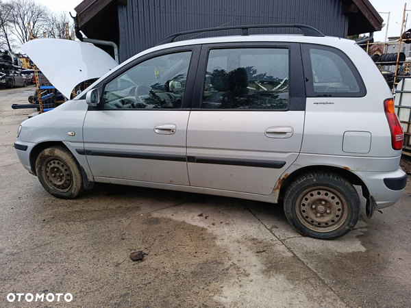 HYUNDAI MATRIX DRZWI TYŁ LEWE PRAWE SJ - 1