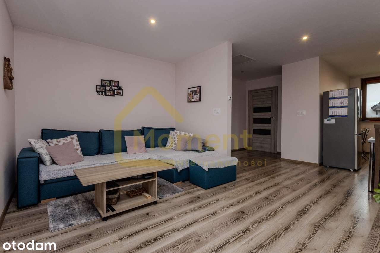 Ekonomiczny dom z garażem i pięknym ogrodem-6