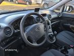 Kia Carens 2.0 CVVT LX - 12