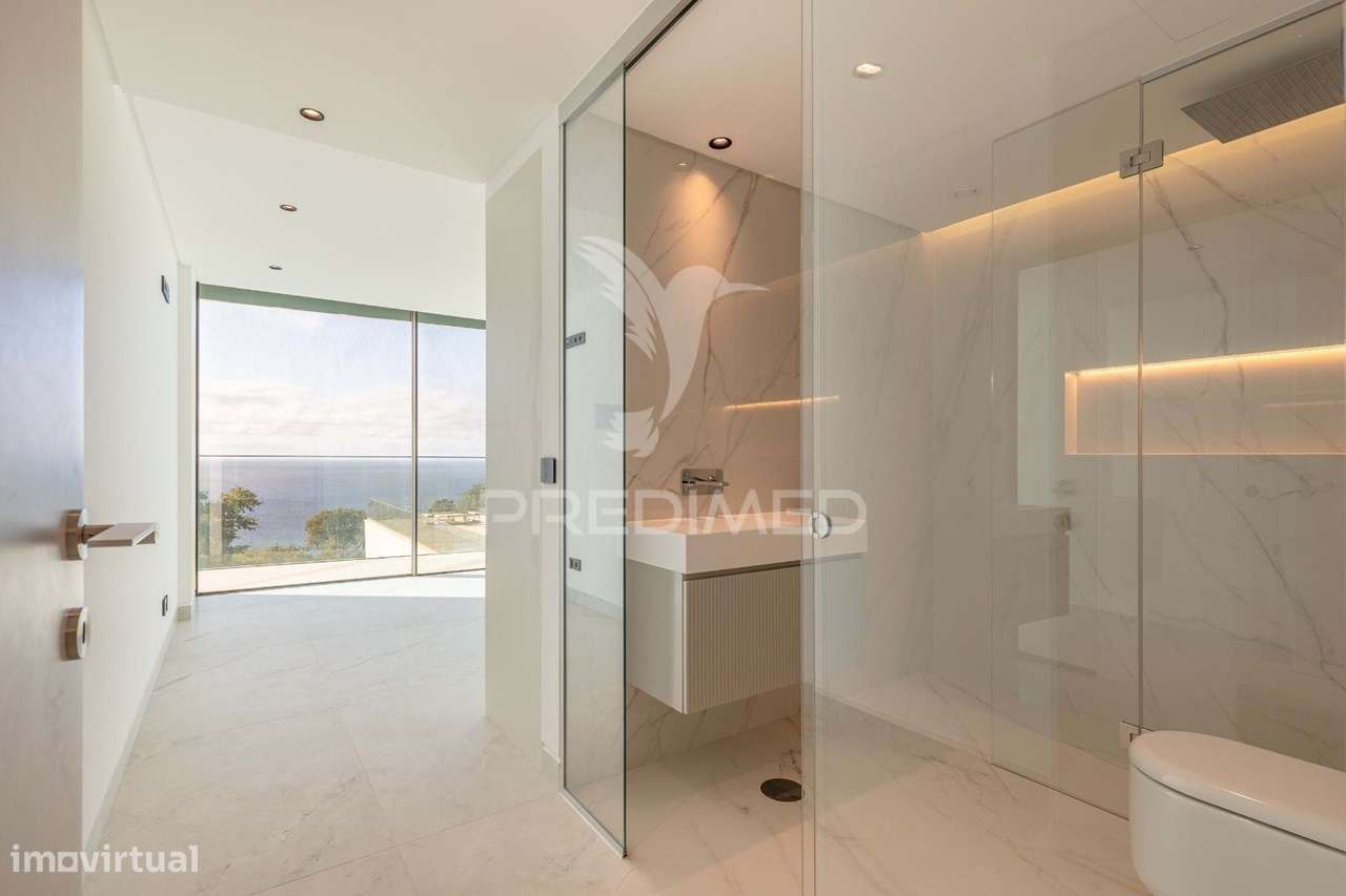 LUXUOSA MORADIA T4 COM PISCINA VISTA MAR.-11