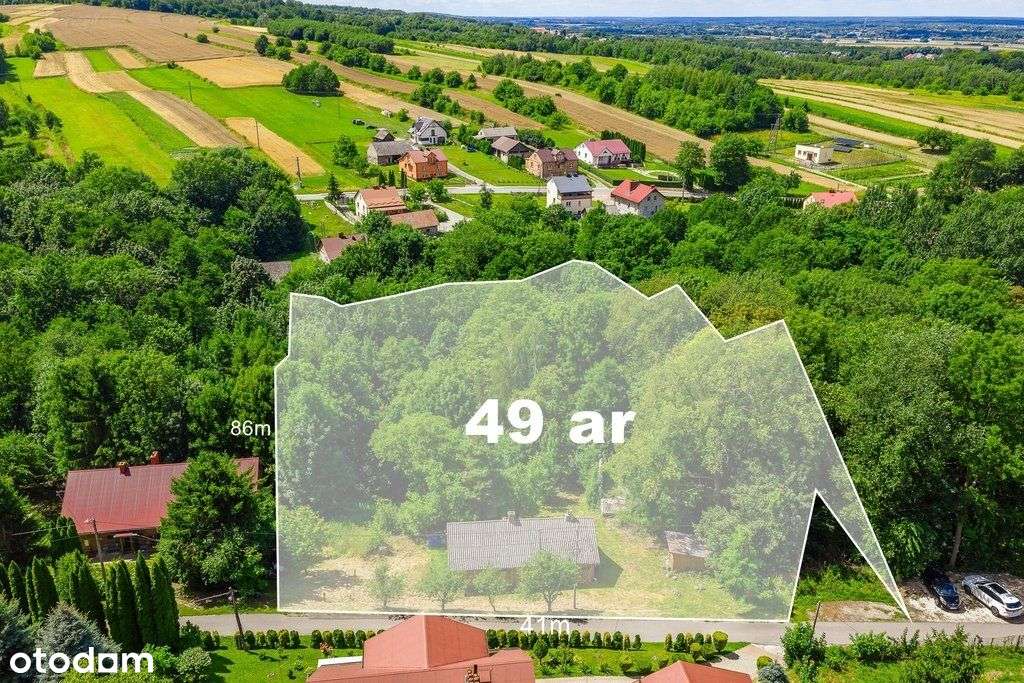 Drewniany dom na 49ar działce blisko Rzeszowa