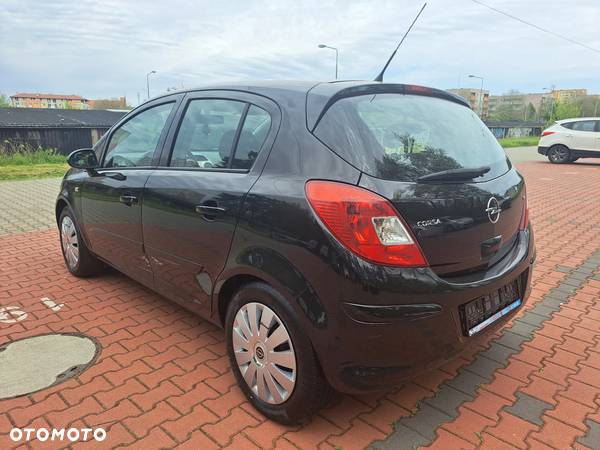 Opel Corsa 1.4 16V Enjoy - 19