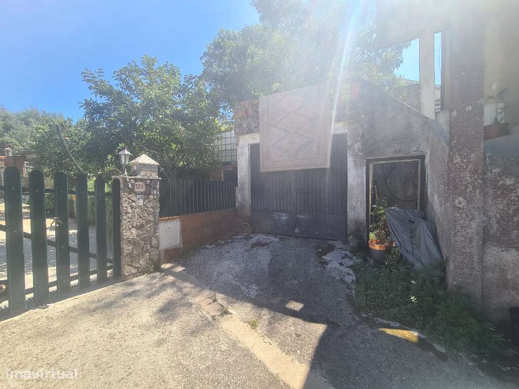 Prédio com T3 com uma loja e garagem em zona de Antanhol - Grande imagem: 3/5