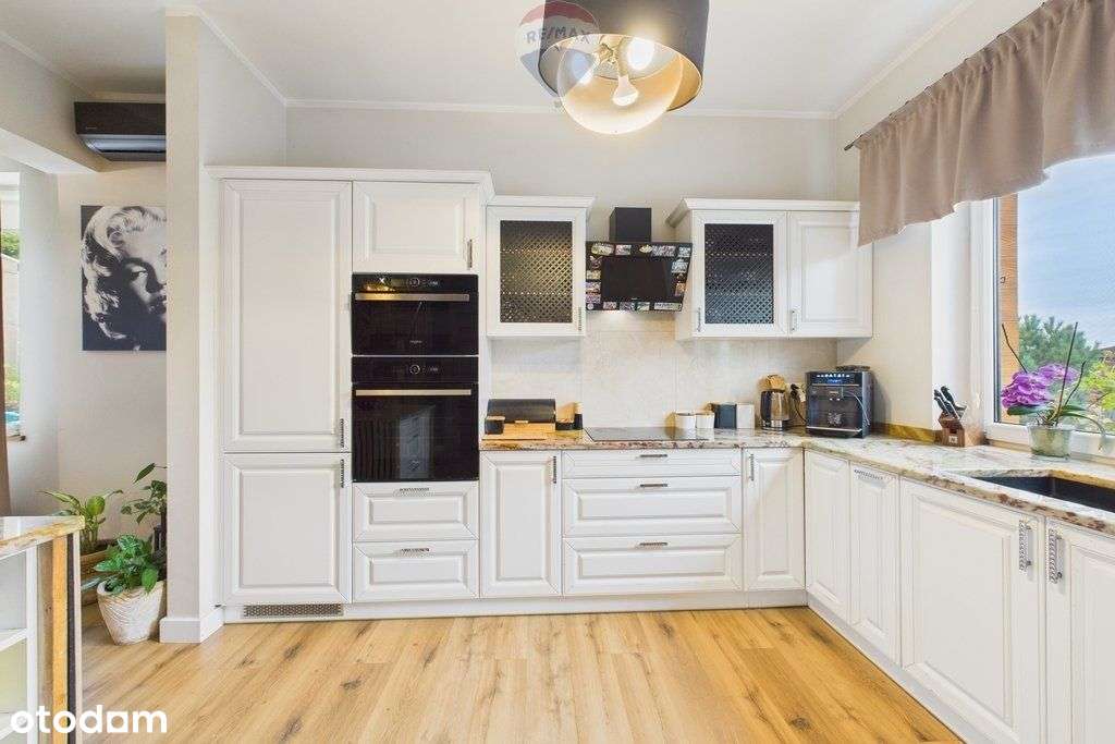 Nowoczesny, energooszczędny dom z pięknym ogrodem - Pełny obrazek: 5/20