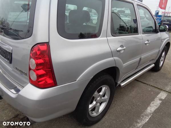 MAZDA TRIBUTE BLOTNIK LEWY PRAWY SREBNY LIFT ORYGIN CZESCI ROZNE - 3