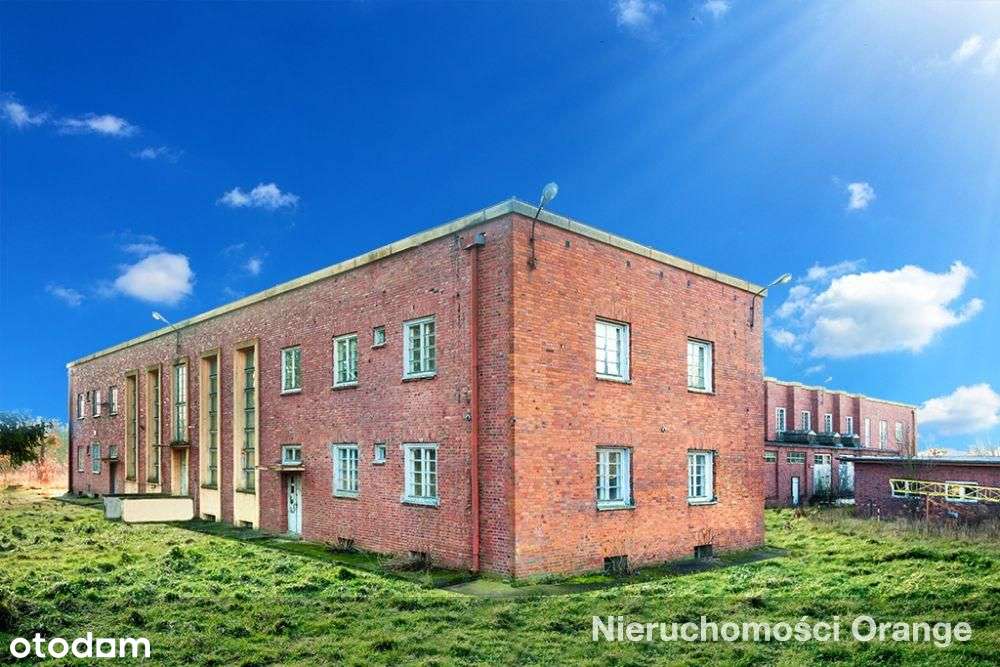 Działka pod działalność m.in. usługową.-14