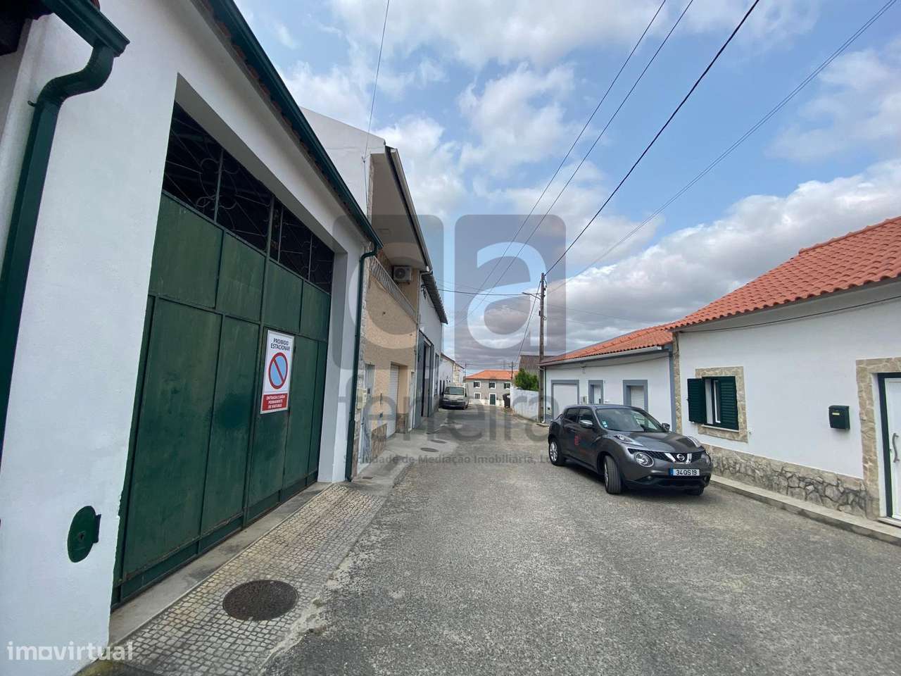 Moradia térrea no centro de Alcanhões para recuperar-9