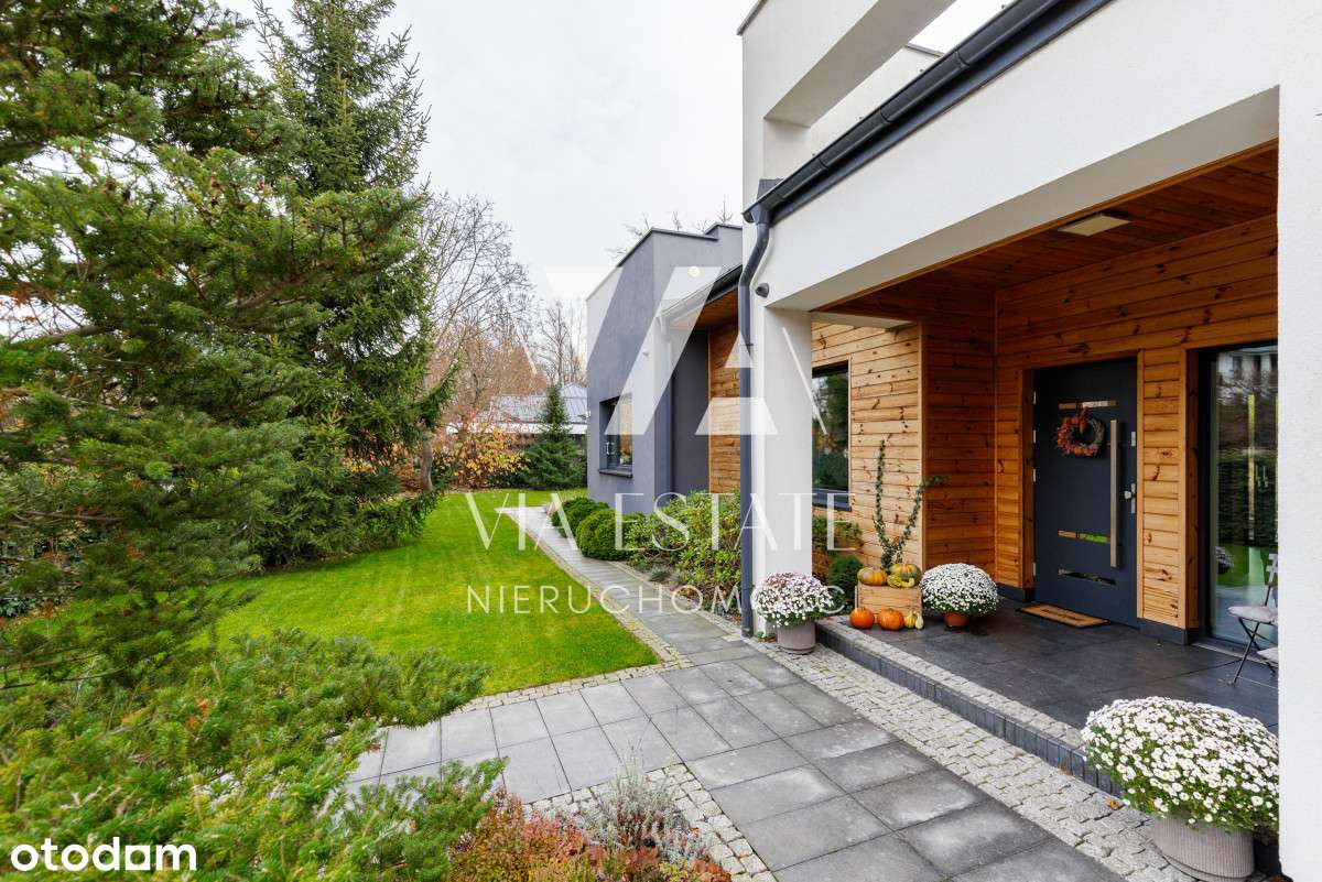 Parterowy nowoczesny dom w Konstancinie I 305m-9