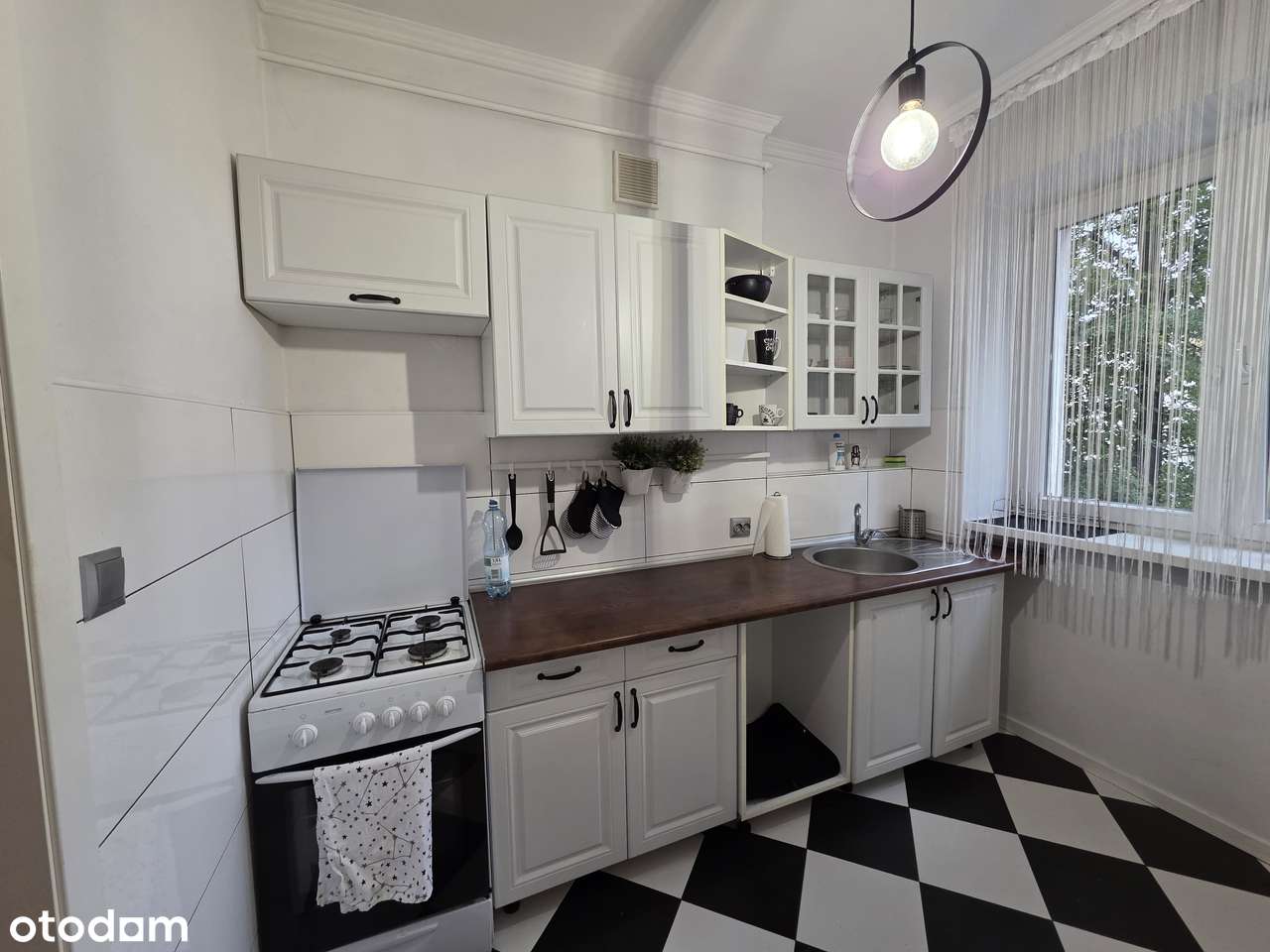 Przestronne mieszkanie 36,7 m² z osobną kuchnią i komórką w cenie.-4