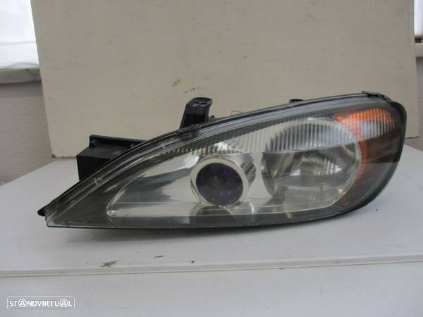 Farol Optica Nissan Primera Esquerdo 1999 a 2002 - 1