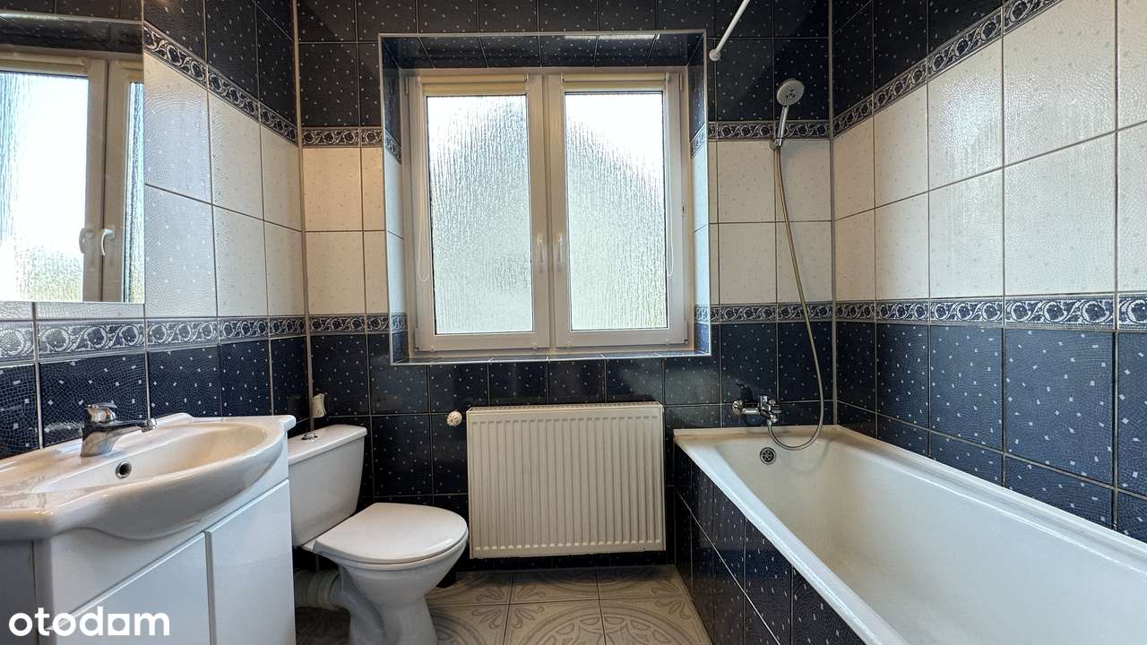 Pół bliźniaka 108 m kw z tarasem, pięknym ogrodem, piwnicą i garażem.-10