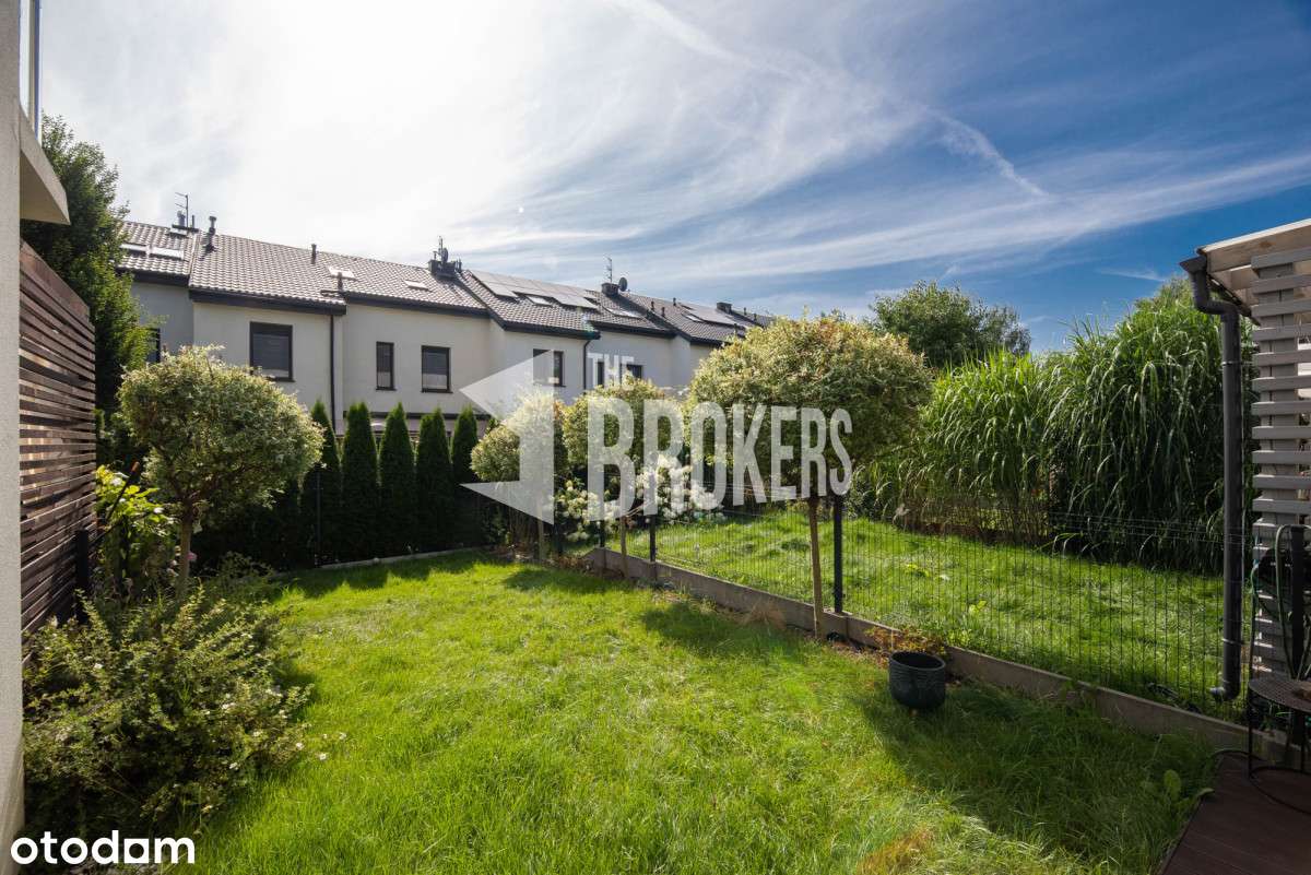 Pięknie wykończony segment z ogrodem i garażem.-5