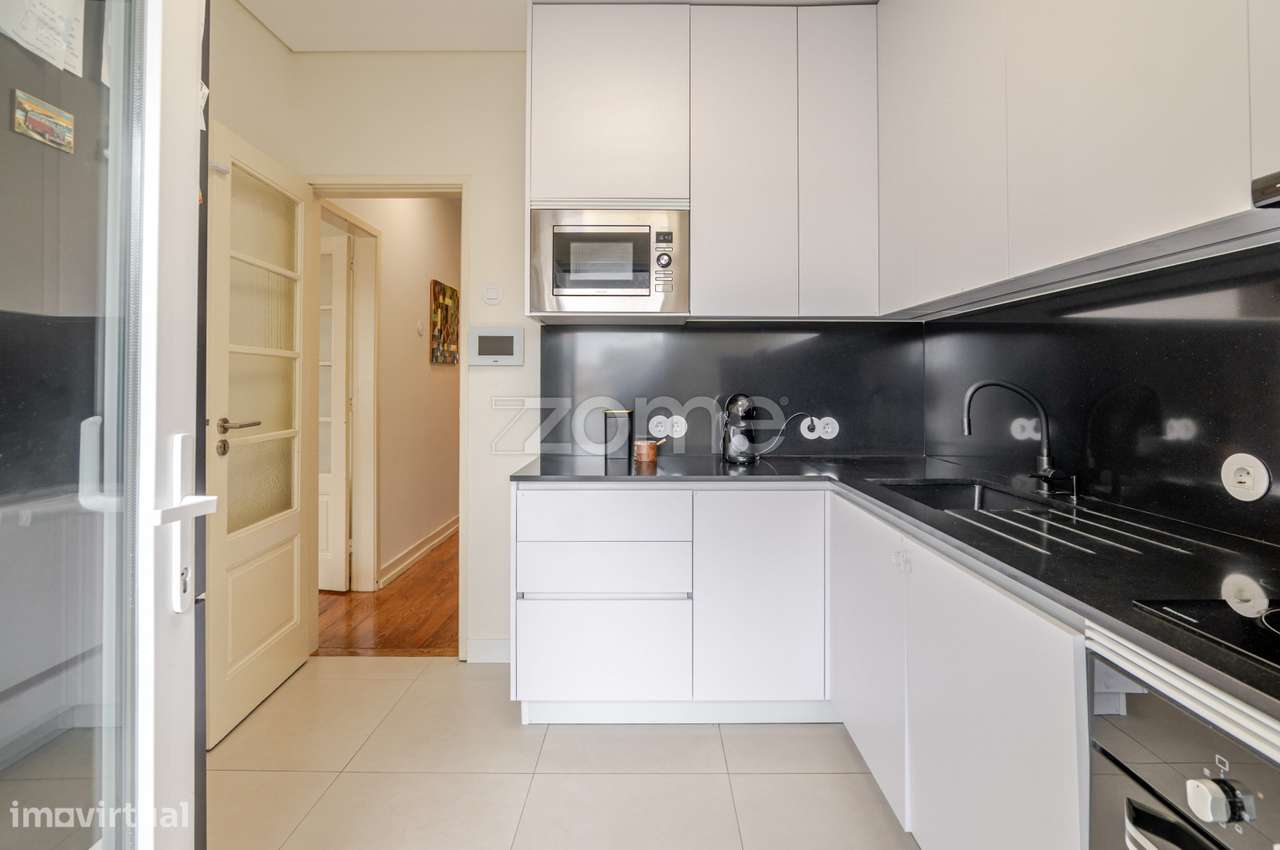 Moradia T3 renovada com jardim nas Antas-12