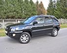 Kia Sportage 2.0 Tour - 1