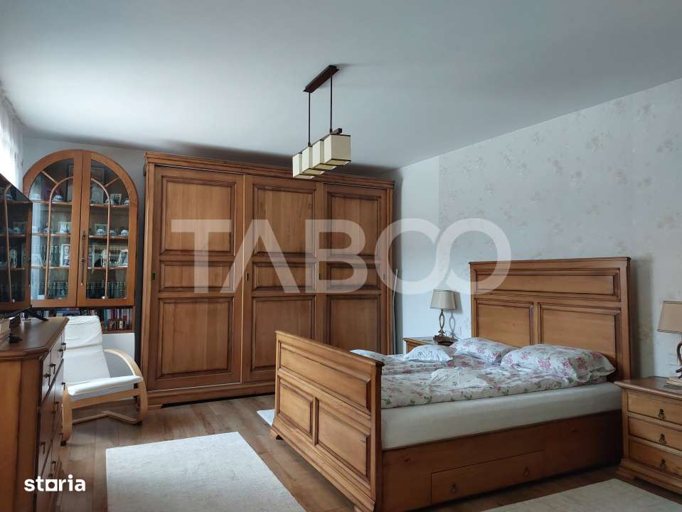 Casa 109 mp 4 camere pivnita terasa loc parcare curte comuna Cisnadie - Imagine principală: 3/19