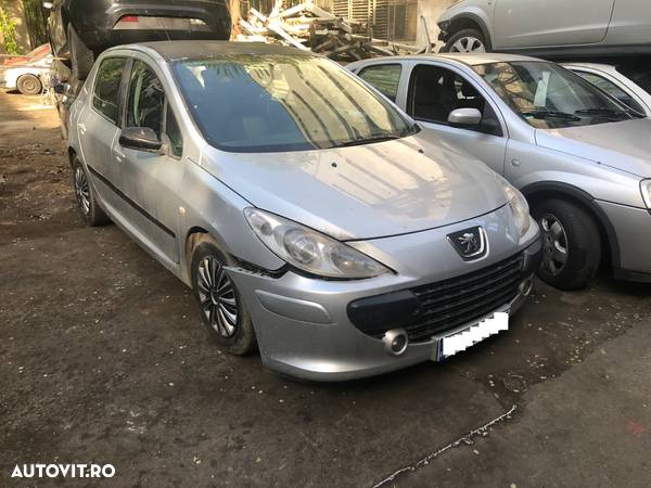 Dezmembrez Peugeot 307 1.6 HDI gri facelift 2006 - 9