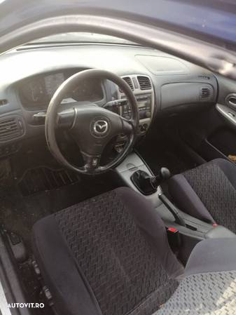 Dezmembrez Mazda 323 - 6