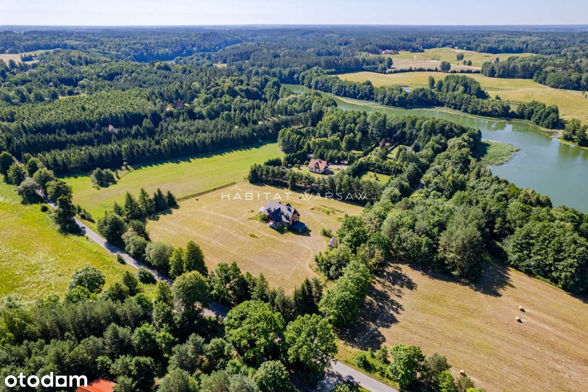 Dom z potencjałem w otoczeniu jeziora i lasu-1